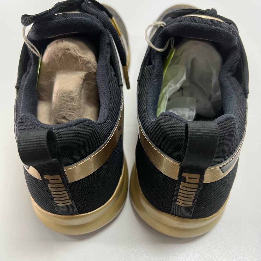 Limited run. Gold and black. Lifestyle oriented sneaker with low foot drop.